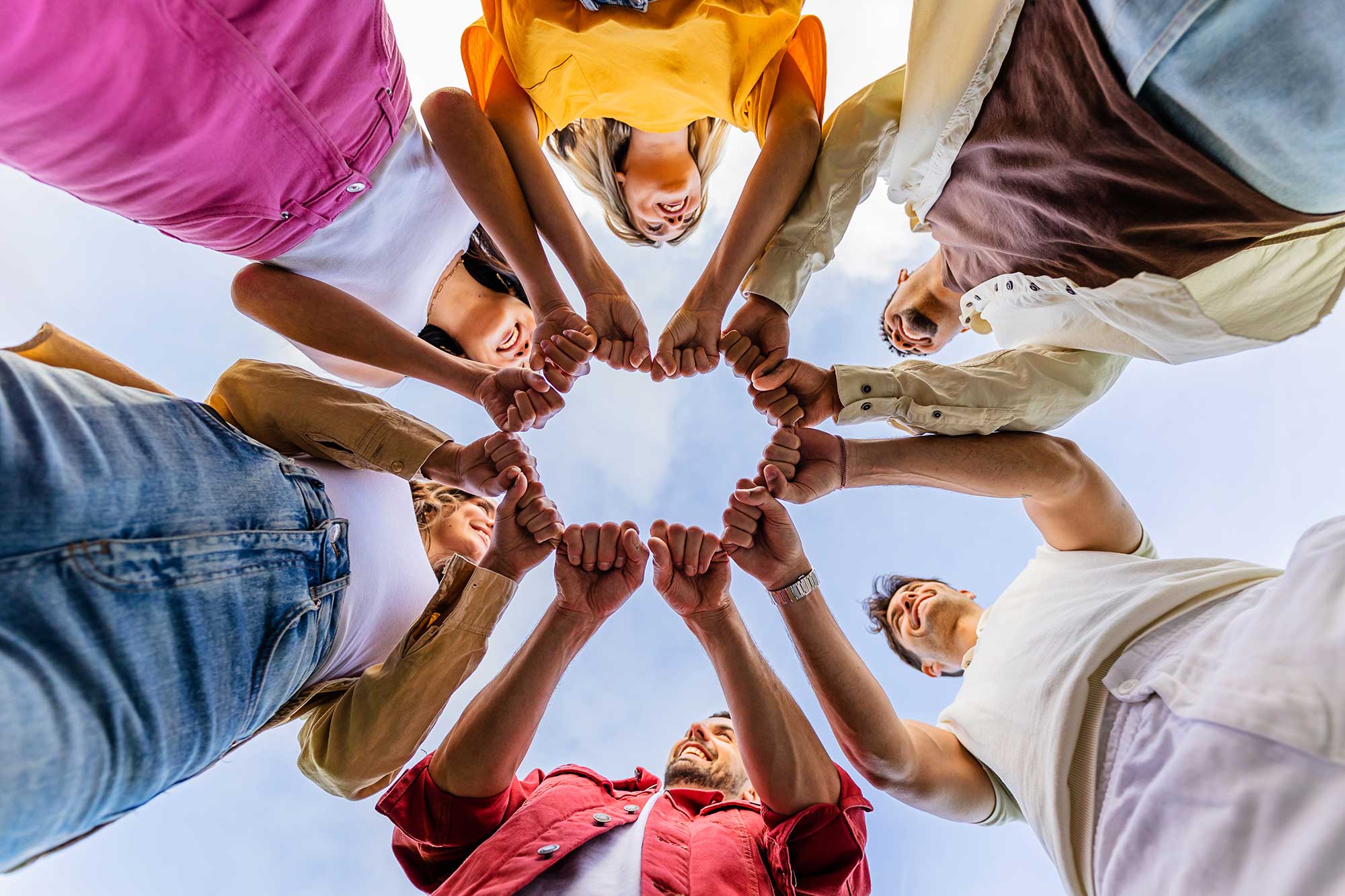 diverse-group-of-people-in-circle-joining-hands-to-2023-06-28-21-17-31-utc.jpg