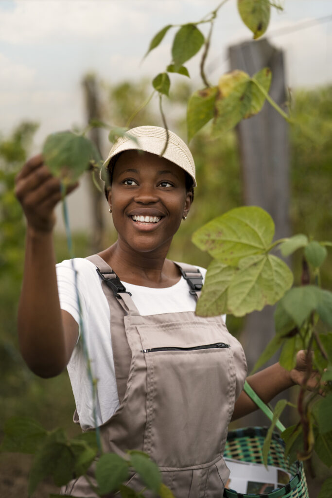 front-view-woman-taking-care-plant