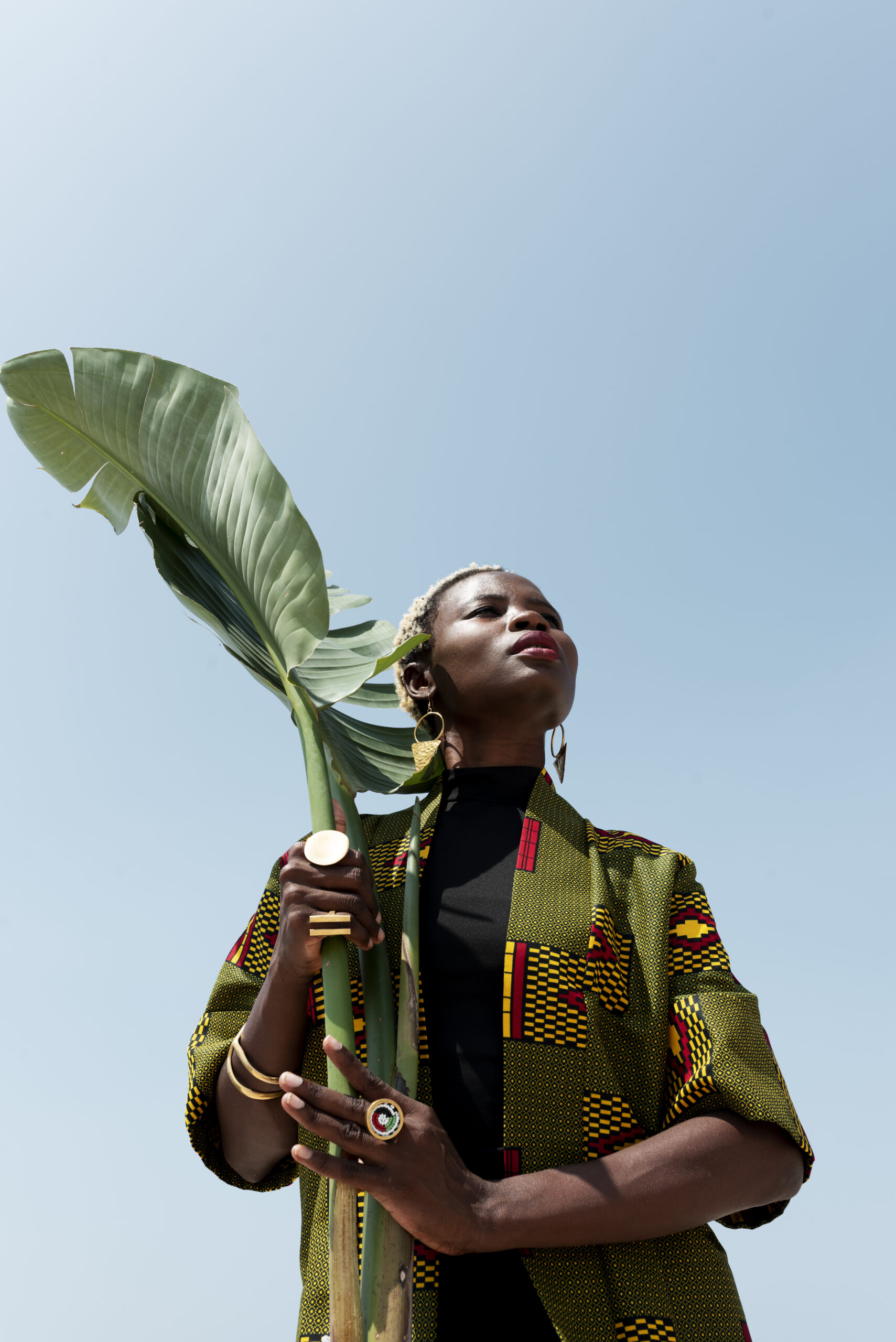 portrait-woman-posing-traditional-african-attire-outdoors